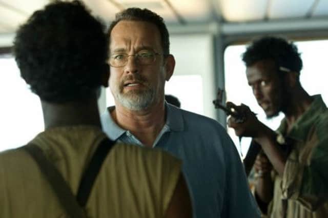 Tom Hanks as Captain Phillips in the eponymously titled film, in which he is rescued by US navy Seals