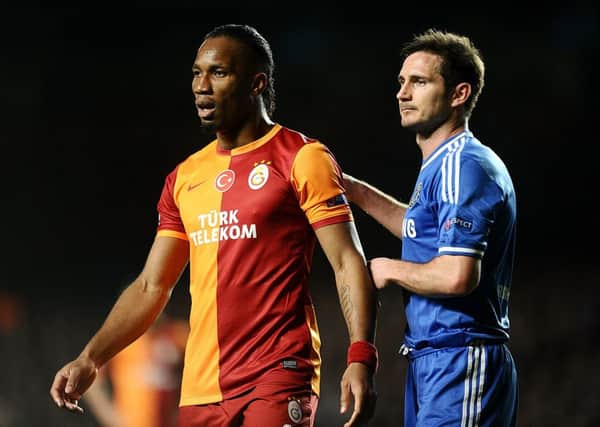 Chelsea's Frank Lampard (right) and Galatasaray's Didier Drogba. Picture: PA