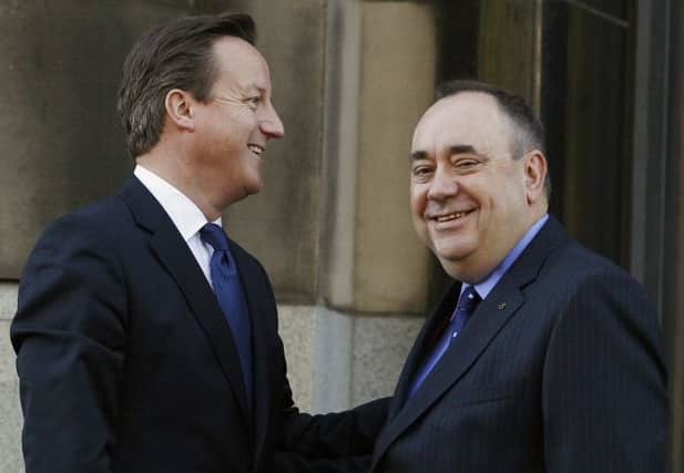 Prime Minister David Cameron (L) is greeted by First Minister Alex Salmond. Picture: Reuters