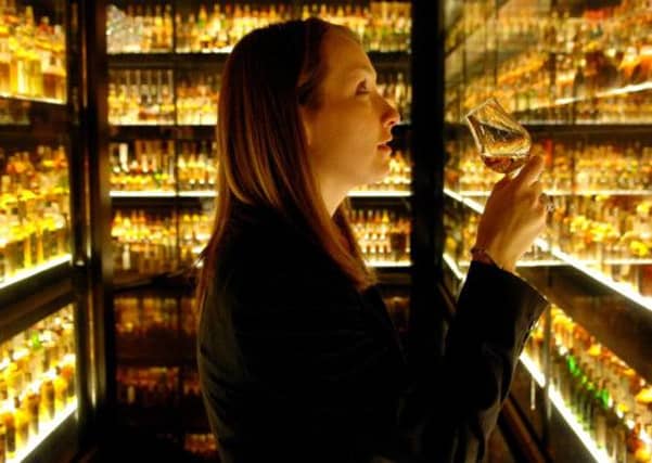 Chancellor George Osborne froze whisky duty, which will please the industry in Scotland. Picture: Neil Hanna