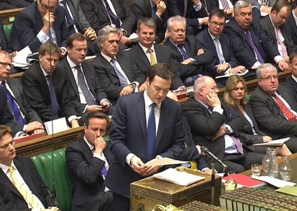 Chancellor of the Exchequer George Osborne delivering his budget in Parliament. Picture: Reuters