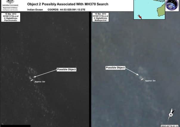 The Australian defence department released satellite images showing possible wreckage from MH370. Picture: AP