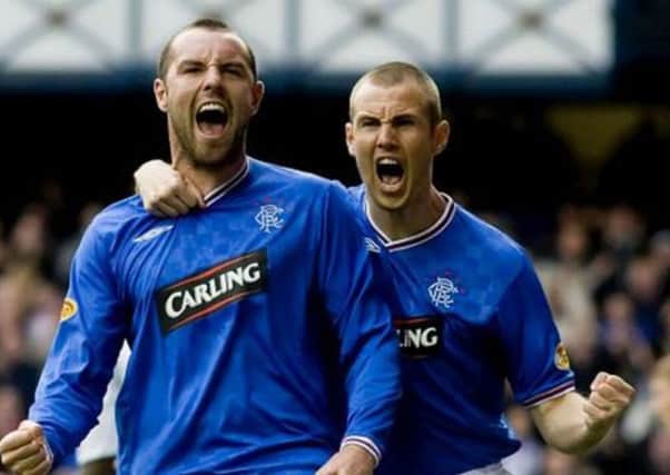 Kris Boyd, left, and Kenny Miller. Could the pair be set for a return to Ibrox? Picture: SNS