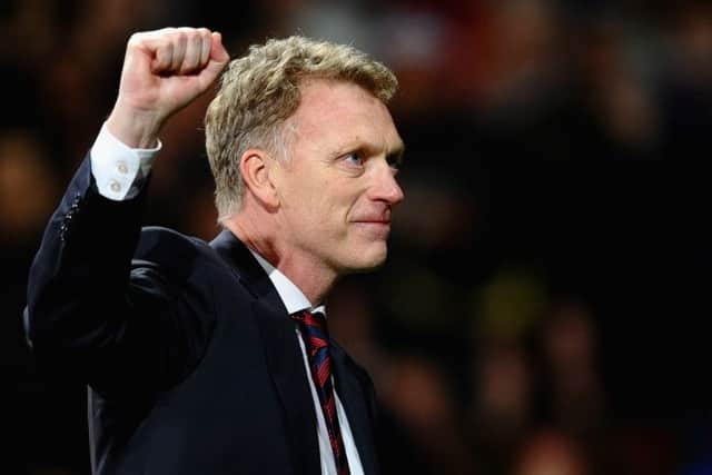 David Moyes celebrates after Manchester United defeat Olympiacos. Picture: Getty