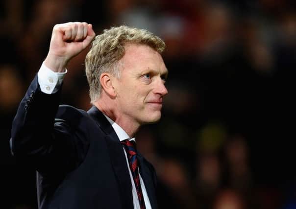David Moyes celebrates after Manchester United defeat Olympiacos. Picture: Getty