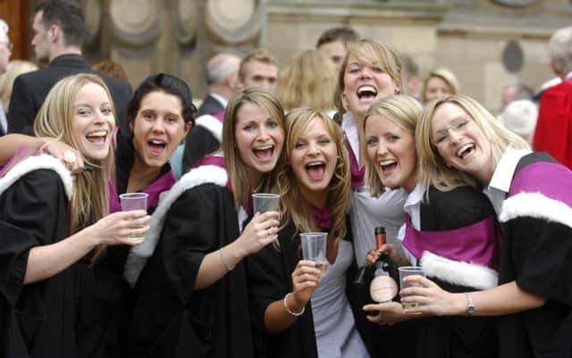Students from the University of Edinburgh celebrate graduating. Picture: Jane Barlow