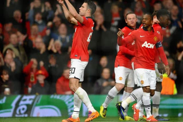 Robin van Persie celebrates his hattrick goal at Old Trafford on Wednesday. Picture: Laurence Griffiths/Getty