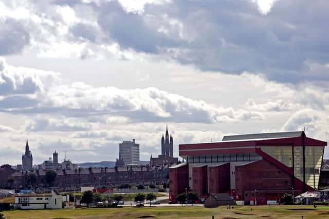 North-east renaissance: Several key figures in business and sport believe Aberdeen can build on the feelgood factor around the football clubs League Cup win, below, and set up a successful professional rugby team