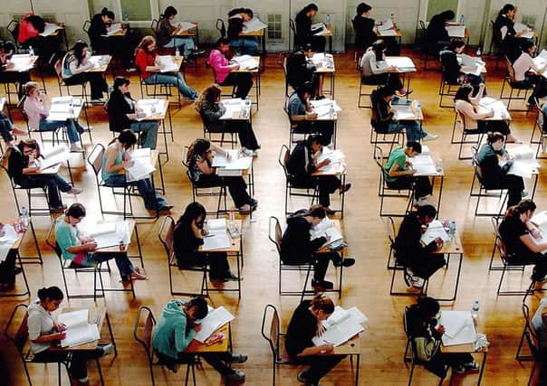 Costs associated with Scotlands new exams are causing cutbacks. Picture: PA