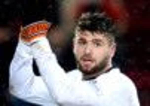 Dundee Utd ace Nadir Ciftci applauds the away support. Picture: SNS