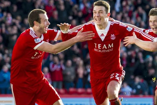 Ryan Jack celebrates netting the winner for Aberdeen, after Adam Rooney cancelled out Kris Boyd's opener. Picture: SNS