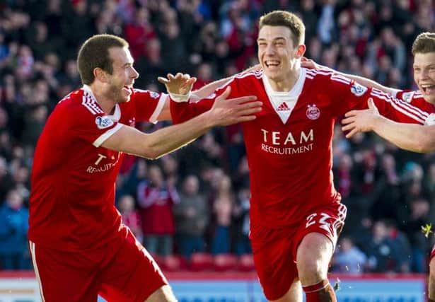 Ryan Jack celebrates netting the winner for Aberdeen, after Adam Rooney cancelled out Kris Boyd's opener. Picture: SNS