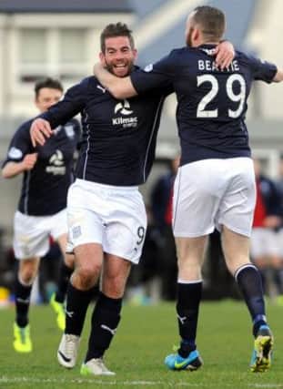Dundee striker Peter MacDonald (left) celebrates his goal with team-mate Craig Beattie. Picture: SNS