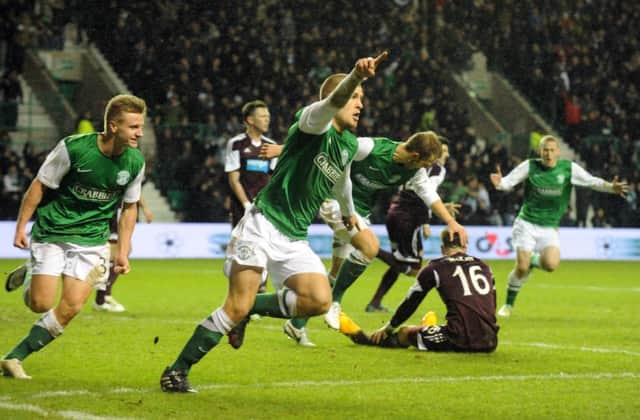 James Collins celebrates after scoring the opener in the last Edinburhg Derby. Picture: Jane Barlow