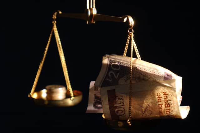 An independent Scotland should ditch the pound, analysts at BlackRock have advised. Picture: TSPL