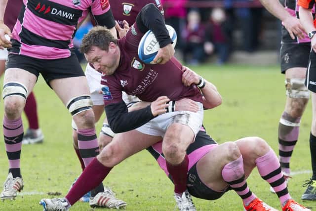 Gala's Andy McLean is tackled by Ayr's Ross Curle. Picture: SNS