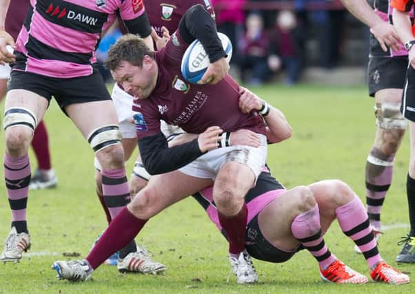 Gala's Andy McLean is tackled by Ayr's Ross Curle. Picture: SNS