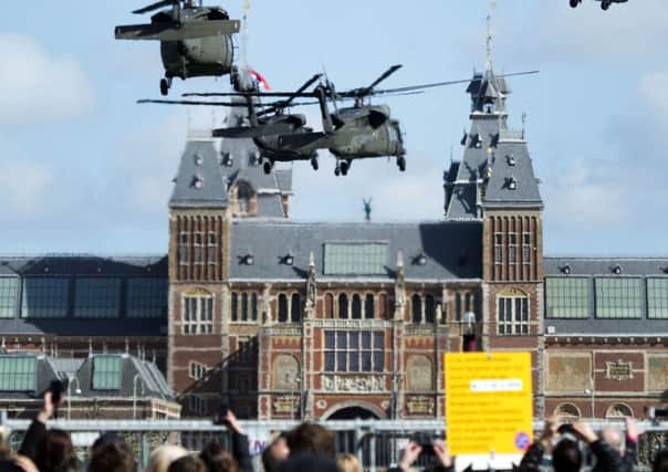 Marine Corps helicopters carrying president Barack Obama land in front of the Rijksmuseum in Amsterdam.Pictures: Getty