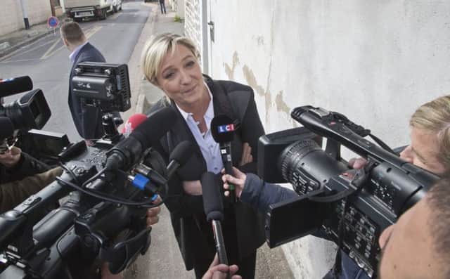 Marine Le Pen addresses the media following a successful weekend for the party.  Picture: AP