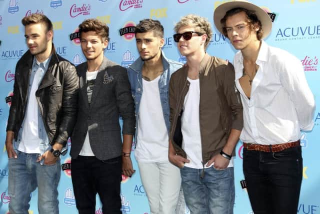 Sweet sound: cakes featuring bands such as One Direction have proved tasty with consumers. Picture: Reuters