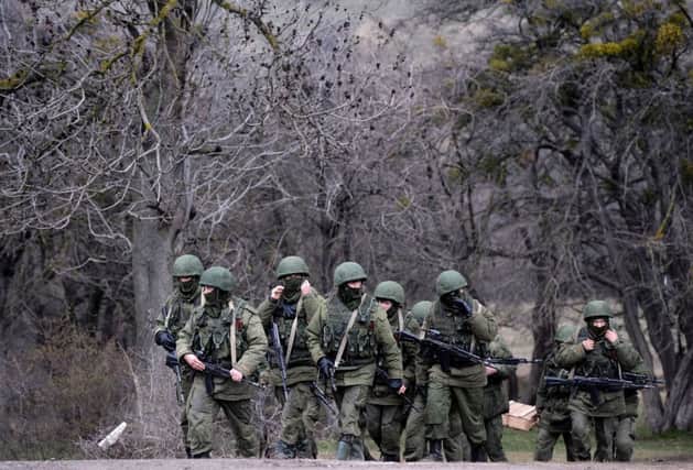 Russian soldiers in Crimea pose questions about independence. Picture: AFP/Getty