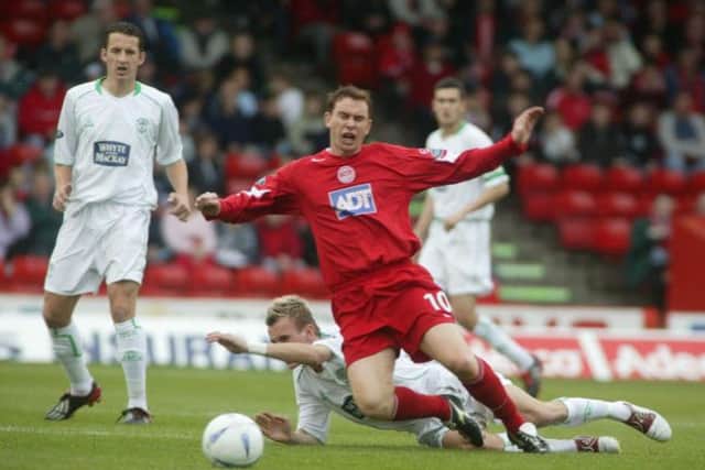 Derek Adams in action for Aberdeen against Hibs at Pittodrie in September 2004. Picture: Paul Reid