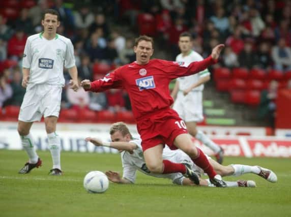 Derek Adams in action for Aberdeen against Hibs at Pittodrie in September 2004. Picture: Paul Reid