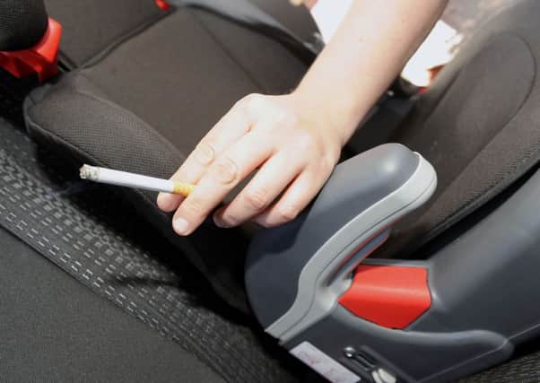 Smoking in the home or car puts children of all ages at risk. Picture: Gary Hutchison