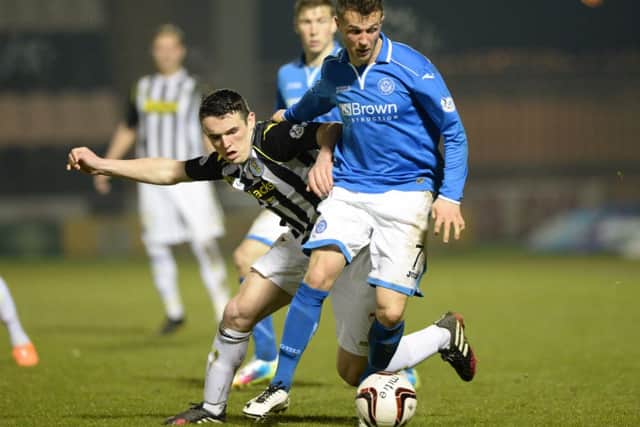 St Mirren's John McGinn (left) battles with Chris Millar. Picture: SNS