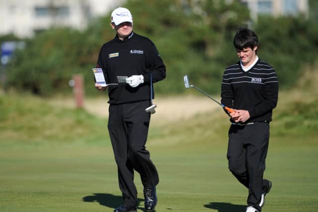 Paul Lawrie playing with son Craig Lawrie. Picture: Jane Barlow