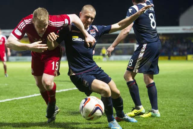 Aberdeen's Barry Robson (left) battles with Erik Cikos. Picture: SNS