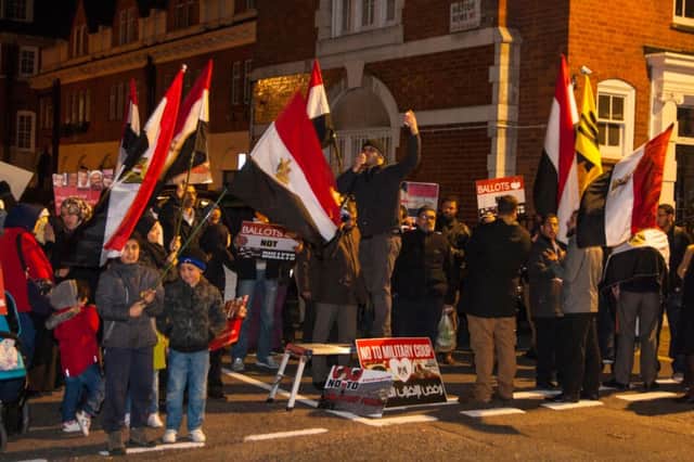 Dozens of UK Egyptians demonstrate outside the Egyptian embassy in London
