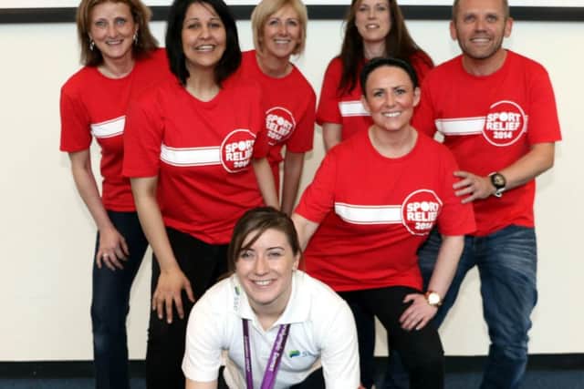Libby Clegg with SSE staff. Picture: Contributed