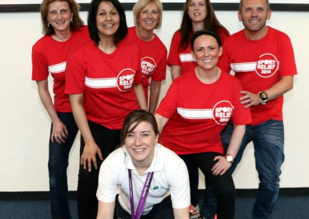 Libby Clegg with SSE staff. Picture: Contributed