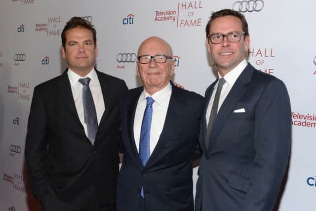 Rupert Murdoch (middle) has given son's Lachlan Murdoch (left) and James Murdoch (right) top roles. Picture: Getty