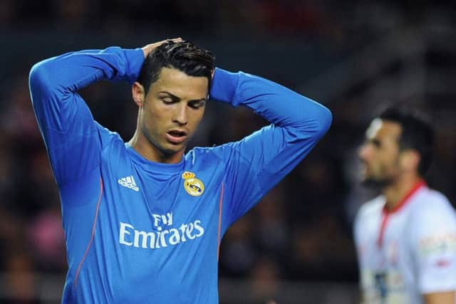 Real Madrids Cristiano Ronaldo shows his frustration during the midweek defeat to Sevilla Picture: Getty