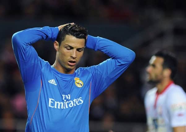 Real Madrids Cristiano Ronaldo shows his frustration during the midweek defeat to Sevilla Picture: Getty