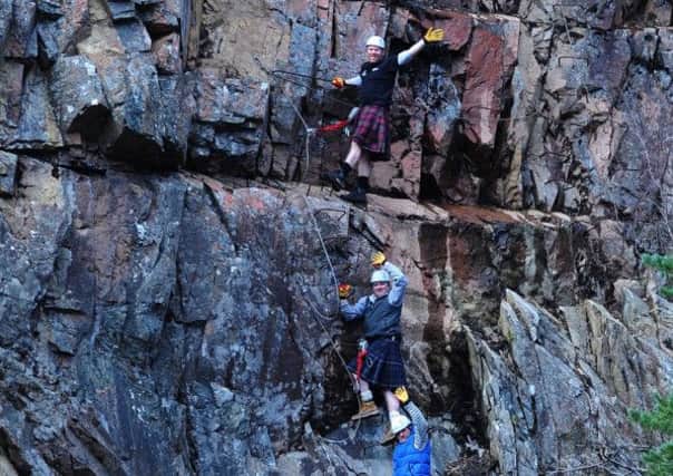 Climbers make their way up the Via Ferrata. Picture: Ian Rutherford