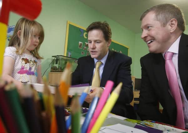 Nick Clegg and Willie Rennie at Banbury Cross Nursery in Aberdeen. Picture: PA