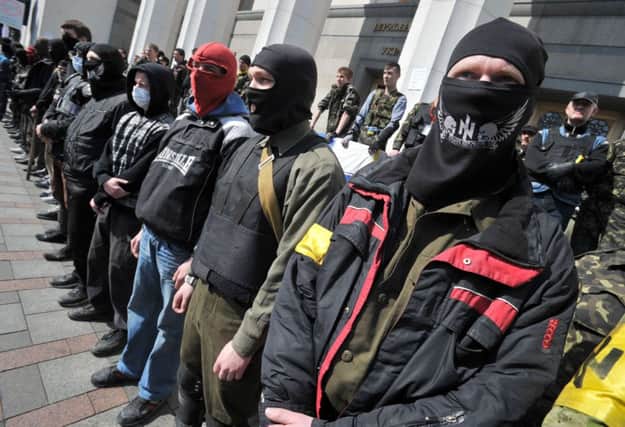 Members of the nationalist group, the Right Sector, outside the Kiev parliament. Picture: Getty