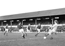 Drew Busby shoots during the 22 draw with Hibs at Tynecastle in April 1977. Pictures: Alan Ledgerwood