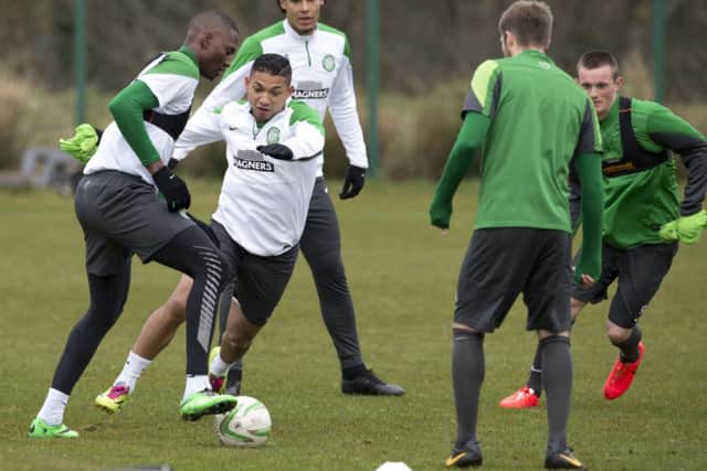 Amido Balde tries to beat the challenge of Emilio Izaguirre during Celtics training session. yesterday. Picture: SNS