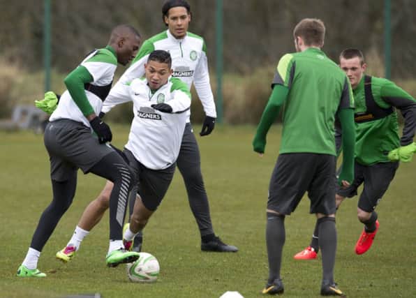 Amido Balde tries to beat the challenge of Emilio Izaguirre during Celtics training session. yesterday. Picture: SNS