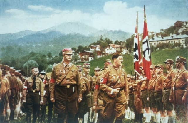 Adolf Hitler inspects a regiment of troops in 1935. Picture: Getty