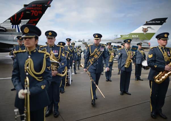 Band of the Royal Air force join personnel from 617 squadron the Dambusters and their sister squadron 12 prepare to take part in a disbandment parade at RAF Lossiemouth. Picture: Getty