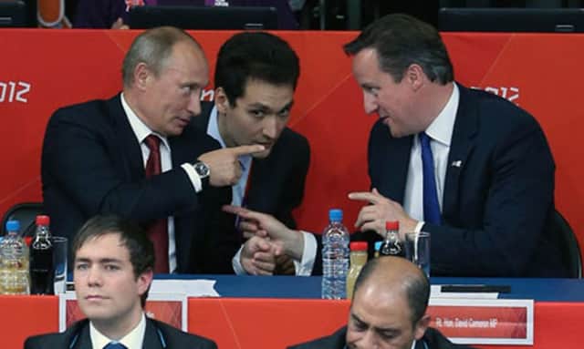 Vladimir Putin and David Cameron at the 2012 Olympics in London. Picture: Getty