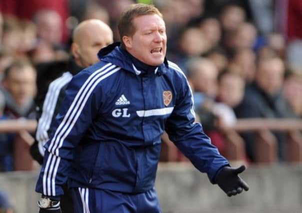 Gary Locke will be aware that city rivals could relegate Hearts. Picture: Johnston Press