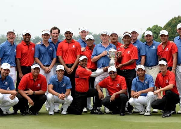 Team Asia and Team Europe celebrate together after the first EurAsia Cup finished in a tie. Picture: Getty