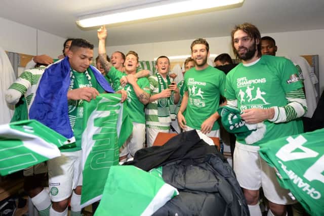 Celtic players celebrate their title win. Picture: SNS