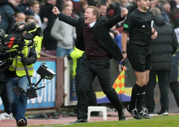 Gary Locke celebrates after Billy King scores his side's second goal of the game. Picture: SNS